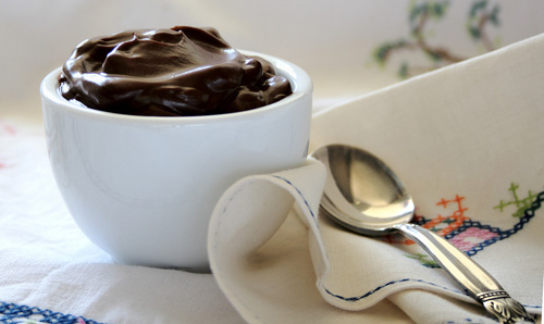 Rich, Dark Chocolate Pudding in a White Ceramic Bowl