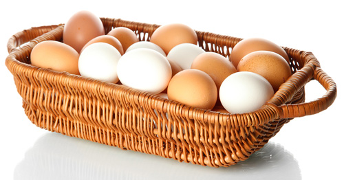 White and Brown Eggs in a Basket